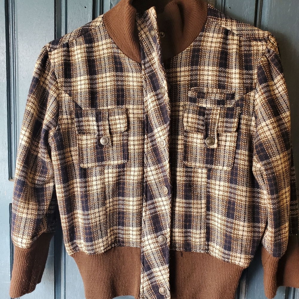 Gently worn brown and plaid jacket